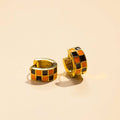 Black & Orange Checkered Enamel Huggie Earrings